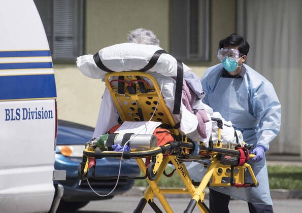 A patient is moved out of Gateway Care & Rehabillition Center, a skilled nursing facility in Hayward, California on Thursday, April 9, 2020. Thirty-five patients have tested positive for COVID-19 along with 24 staffers. Six patients have died.  SXP2020040910 TERRYxSCHMITT