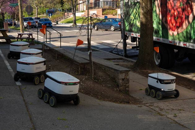 April 9, 2020: A Starship Technologies robot returns back to Broad Branch Market after delivering food to residents in Washington, DC on Thursday, April 9, 2020. Broad Branch Market has closed their store due to COVID 19 and operating with phone-in orders, purchasing small items at the window and using Starship Technologies for robotic deliveries of food to the neighborhood. - ZUMAc206 20200409_zap_c206_015 Copyright: xKenxCedenox