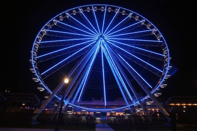The Wheel at St. Louis Union Station is bathed in blue, beginning today in St. Louis Thursday, April 9, 2020. Many buildings in St. Louis are lit in blue in support of the LightItBlue campaign. The initiative, which originated in the United Kingdom, calls for buildings, bridges and landmarks with the capability to turn their lights blue as a show of gratitude to those health care professionals and essential workers caring for people on the front lines during the COVID-19 pandemic.  SLP2020040902 BILLxGREENBLATT
