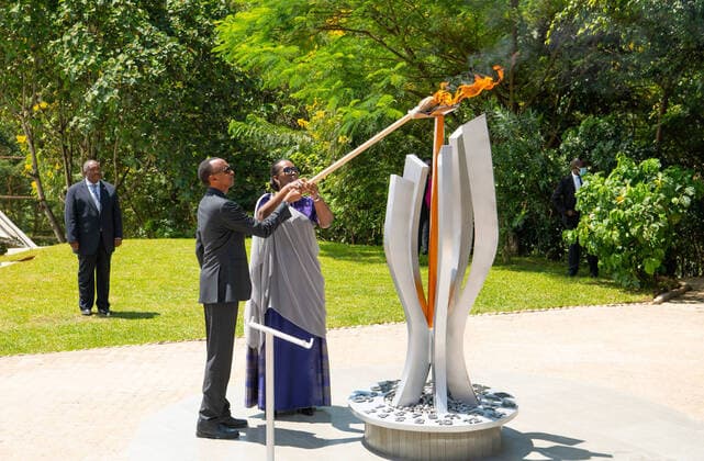 (200410) -- BEIJING, April 10, 2020 -- Rwandan president Paul Kagame and first lady Jeannette Kagame light a flame of remembrance at the , the final resting place for more than 250,000 victims of the 1994 genocide against the Tutsis, in Kigali, capital city of Rwanda, on April 7, 2020. ( Handout via Xinhua) XINHUA PHOTOS OF THE DAY KigalixGenocidexMemorial 