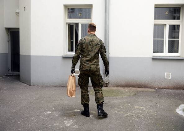 Soldiers of the Territorial Defense Forces deliver food packages before the Easter Soldiers of the Territorial Defense Forces deliver food packages before the Easter within charity action Neighbour to Neighbour to those in need during the coronavirus outbreak on April 10, 2020 in Warsaw, Poland, EN_01424278_0015 
