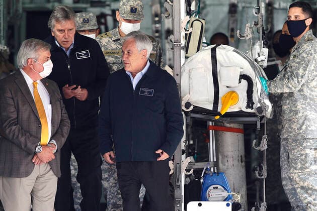 Santiago, April 10, 2020 The President of the Republic, Sebastian Pinera, accompanied by the Ministers of Defense, Alberto Espina, and Health, Jaime Manalich, inspects the support operations of the Armed Forces for global coronavirus pandemic, visiting facilities of Group 10 of the Fach Dragomir Yankovic Aton Chile, Santiago Chile Aton 411204 Copyright: DRAGOMIRxYANKOVIC ATONxCHILE