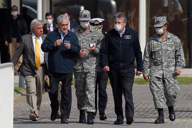 Santiago, April 10, 2020 The President of the Republic, Sebastian Pinera, accompanied by the Ministers of Defense, Alberto Espina, and Health, Jaime Manalich, inspects the support operations of the Armed Forces for global coronavirus pandemic, visiting facilities of Group 10 of the Fach Dragomir Yankovic Aton Chile, Santiago Chile Aton 411216 Copyright: DRAGOMIRxYANKOVIC ATONxCHILE