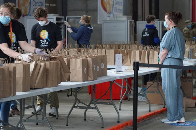 April 10, 2020, New York, New York, USA: Military and health care workers line up for lunch at the World Central Kitchen community kitchen, operated by Chef Jose Andres and Chefs for America, .The Javits Center,NYC.April 10, 2020.Photos by Sonia Moskowitz. New York USA - ZUMAm334 20200410_zep_m334_002 Copyright: xSoniaxMoskowitzxGordonx