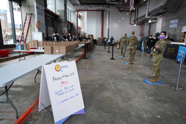 April 10, 2020, New York, New York, USA: Military and health care workers line up for lunch at the World Central Kitchen community kitchen, operated by Chef Jose Andres and Chefs for America, .The Javits Center,NYC.April 10, 2020.Photos by Sonia Moskowitz. New York USA - ZUMAm334 20200410_zep_m334_011 Copyright: xSoniaxMoskowitzxGordonx