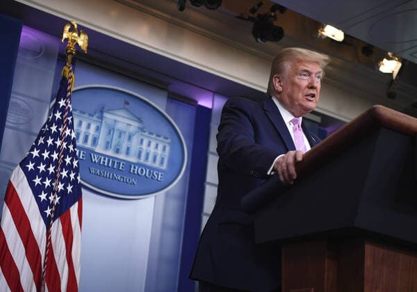 President Donald Trump speaks at a Coronavirus briefing at the White House on Friday, April 10, 2020, in Washington, DC. With the U.S. death toll from the coronavirus pandemic expected to peak over the weekend, most of the country will be firmly under stay-at-home orders on Easter Sunday.  WAS2020410510 KEVINxDIETSCH