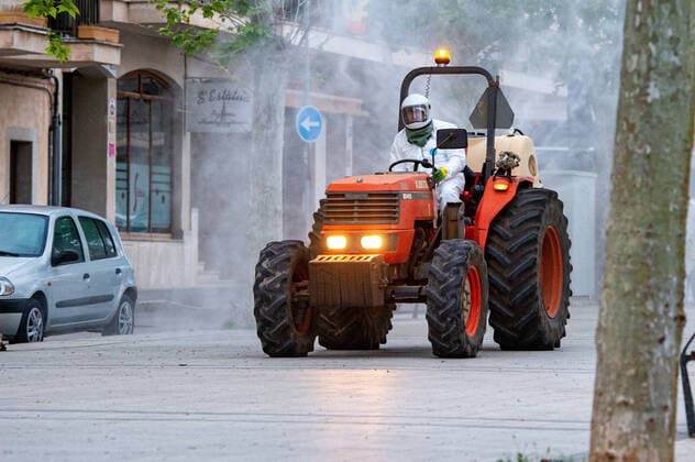 20200410 Corona Lock Down PALMA DE MALLORCA, SPAIN APRIL 10 2020 Tractor disinfects streets in Llucmajor in Mallorca at Corona Lock Down on April 10, 2020 in Palma de Mallorca, Palma de Mallorca Baleares Spain