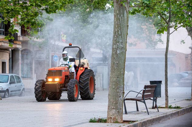20200410 Corona Lock Down PALMA DE MALLORCA, SPAIN APRIL 10 2020 Tractor disinfects streets in Llucmajor in Mallorca at Corona Lock Down on April 10, 2020 in Palma de Mallorca, Palma de Mallorca Baleares Spain