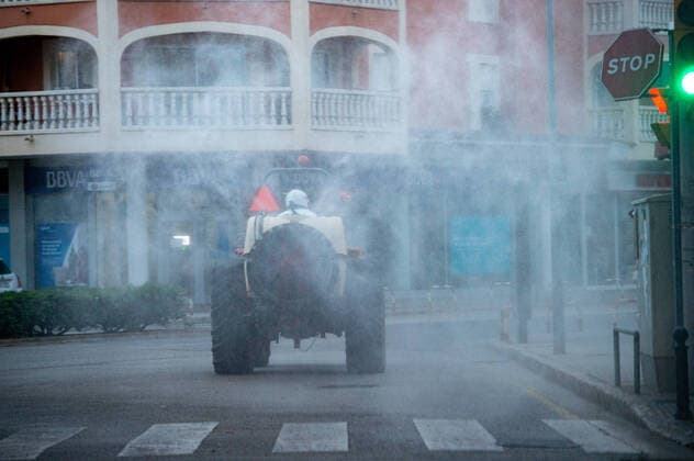 20200410 Corona Lock Down PALMA DE MALLORCA, SPAIN APRIL 10 2020 Tractor disinfects streets in Llucmajor in Mallorca at Corona Lock Down on April 10, 2020 in Palma de Mallorca, Palma de Mallorca Baleares Spain