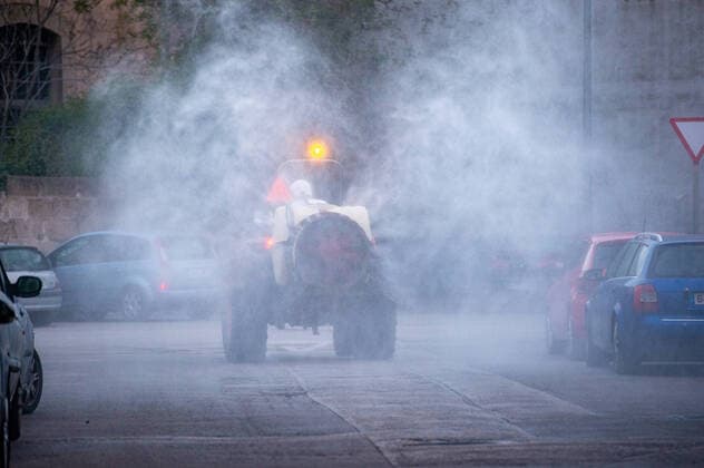 20200410 Corona Lock Down PALMA DE MALLORCA, SPAIN APRIL 10 2020 Tractor disinfects streets in Llucmajor in Mallorca at Corona Lock Down on April 10, 2020 in Palma de Mallorca, Palma de Mallorca Baleares Spain