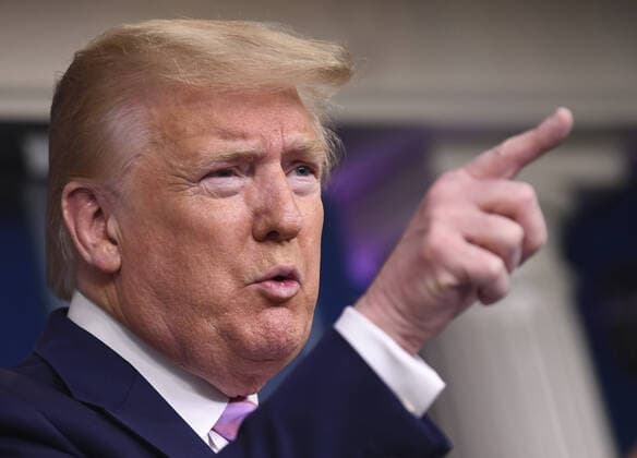 President Donald Trump takes a question at a Coronavirus briefing at the White House on Friday, April 10, 2020, in Washington, DC. With the U.S. death toll from the coronavirus pandemic expected to peak over the weekend, most of the country will be firmly under stay-at-home orders on Easter Sunday.  WAS2020410529 KEVINxDIETSCH