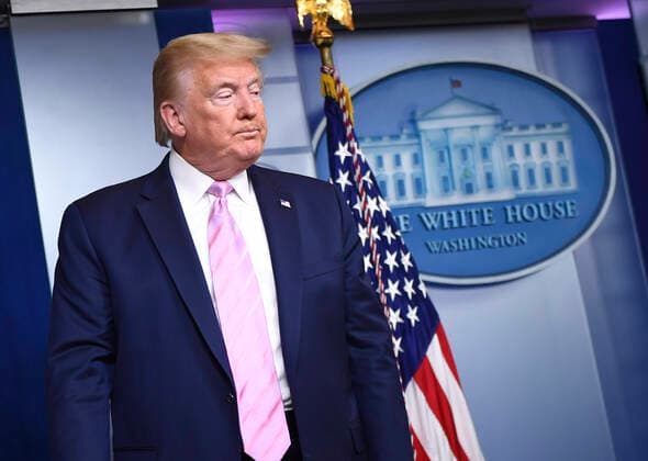 April 10, 2020, Washington, District of Columbia, USA: United States President Donald J. Trump attends a Coronavirus briefing at the White House on Friday, April 10, 2020, in Washington, DC. With the U.S. death toll from the coronavirus pandemic expected to peak over the weekend, most of the country will be firmly under stay-at-home orders on Easter Sunday. .Credit: Pool via CNP Washington USA - ZUMAs152 20200410_zaa_s152_037 Copyright: xKevinxDietschx