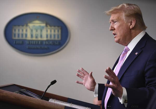 President Donald Trump speaks at a Coronavirus briefing at the White House on Friday, April 10, 2020, in Washington, DC. With the U.S. death toll from the coronavirus pandemic expected to peak over the weekend, most of the country will be firmly under stay-at-home orders on Easter Sunday.  WAS2020410538 KEVINxDIETSCH