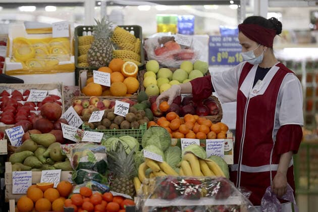 NOVOSIBIRSK, RUSSIA - APRIL 11, 2020: Fruits and vegetables for sale at the Oktyabrsky food market. Russian President Vladimir Putin has expanded non-working period till April 30, 2020 to prevent the spread of the novel coronavirus. Kirill Kukhmar TASS  TS0D5471