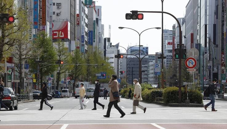 New coronavirus Few people are seen in Tokyo s Shinjuku area on April 11, 2020, under a state of emergency over the coronavirus pandemic. 