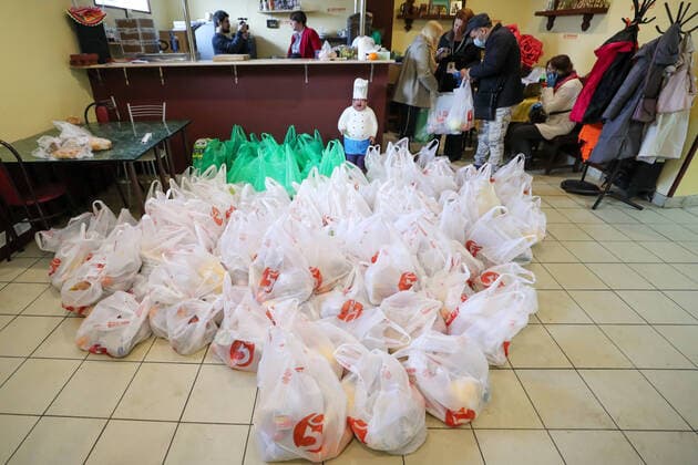 ST PETERSBURG, RUSSIA - APRIL 11, 2020: Volunteers of the DobroDomik Charity Fund packing free groceries for solitary elderly people. Alexander Demianchuk TASS  TS0D54D0