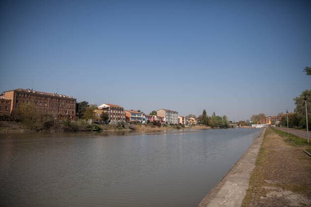 Italy: Dock of Ferrara during the COVID-19 The beautiful dock of Ferrara with peace and quiet during the COVID-19 emergency. Ferrara Emilia Romagna Italy Copyright: CarloxVergani