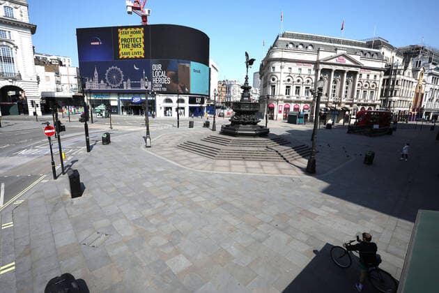 Day Nineteen of Lockdown in London. An almost deserted Piccadilly Circus in London on Easter Saturday. It is the first public holiday of the year, and many people enjoy the long weekend by going out and about or on holiday, but this year the country is on lockdown due to the COVID-19 Coronavirus pandemic. People are not allowed to leave home except for minimal food shopping, medical treatment, exercise - once a day, and essential work. COVID-19 Coronavirus lockdown, London, UK, on April 11, 2020 