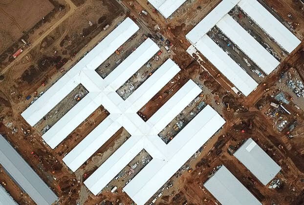 MOSCOW, RUSSIA - APRIL 11, 2020: An aerial view of the construction site of a new infectious diseases hospital for COVID-19 coronavirus patients by the village of Golokhvastovo. Mikhail Japaridze TASS  TS0D5530