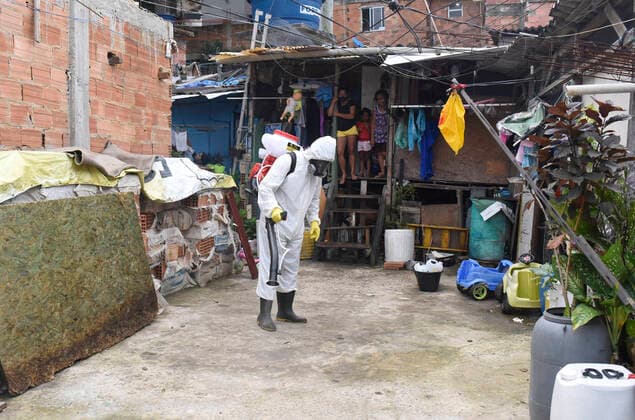 April 10, 2020: April 11.., 2020, Rio De Janeiro - ......Residents of the Santa Marta favela, in Botafogo, in the South Zone of Rio, start this Friday (10) to work on cleaning the areas of the community on their own. The objective is to prevent the lack of sanitary conditions from facilitating the expansion of the Covid-19 region. volunteers start the process with personal protective equipment (PPE). The Botafogo neighborhood, where the Santa Marta slum is located, had 36 confirmed cases of the new coronavirus as of this Sunday, according to the State Health Secretariat Panel. In the municipality of Rio alone, 1068 cases were recorded, according to the same panel. Cases across the state totaled 1394 cases..on April 10, 2020. - ZUMAt142 20200410_zap_t142_002 Copyright: xFabioxTeixeirax