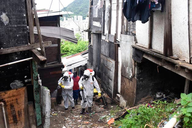 April 10, 2020: April 11.., 2020, Rio De Janeiro - ......Residents of the Santa Marta favela, in Botafogo, in the South Zone of Rio, start this Friday (10) to work on cleaning the areas of the community on their own. The objective is to prevent the lack of sanitary conditions from facilitating the expansion of the Covid-19 region. volunteers start the process with personal protective equipment (PPE). The Botafogo neighborhood, where the Santa Marta slum is located, had 36 confirmed cases of the new coronavirus as of this Sunday, according to the State Health Secretariat Panel. In the municipality of Rio alone, 1068 cases were recorded, according to the same panel. Cases across the state totaled 1394 cases..on April 10, 2020. - ZUMAt142 20200410_zap_t142_004 Copyright: xFabioxTeixeirax