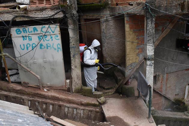 April 10, 2020: April 11.., 2020, Rio De Janeiro - ......Residents of the Santa Marta favela, in Botafogo, in the South Zone of Rio, start this Friday (10) to work on cleaning the areas of the community on their own. The objective is to prevent the lack of sanitary conditions from facilitating the expansion of the Covid-19 region. volunteers start the process with personal protective equipment (PPE). The Botafogo neighborhood, where the Santa Marta slum is located, had 36 confirmed cases of the new coronavirus as of this Sunday, according to the State Health Secretariat Panel. In the municipality of Rio alone, 1068 cases were recorded, according to the same panel. Cases across the state totaled 1394 cases..on April 10, 2020. - ZUMAt142 20200410_zap_t142_011 Copyright: xFabioxTeixeirax