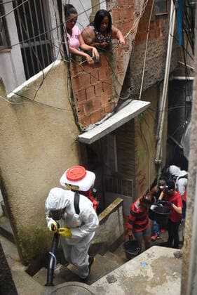 April 10, 2020: April 11.., 2020, Rio De Janeiro - ......Residents of the Santa Marta favela, in Botafogo, in the South Zone of Rio, start this Friday (10) to work on cleaning the areas of the community on their own. The objective is to prevent the lack of sanitary conditions from facilitating the expansion of the Covid-19 region. volunteers start the process with personal protective equipment (PPE). The Botafogo neighborhood, where the Santa Marta slum is located, had 36 confirmed cases of the new coronavirus as of this Sunday, according to the State Health Secretariat Panel. In the municipality of Rio alone, 1068 cases were recorded, according to the same panel. Cases across the state totaled 1394 cases..on April 10, 2020. - ZUMAt142 20200410_zap_t142_017 Copyright: xFabioxTeixeirax