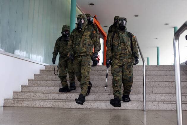 Spain: 29th day of alert status for CoVid-19 Gijon, SPAIN: Several soldiers descend the stairs of the Gijon train station during the 29th day of the Spanish Alert State, in Gijon, Spain on April 11, 2020. Gijon Asturias Spain Copyright: AlbertoxBrevers