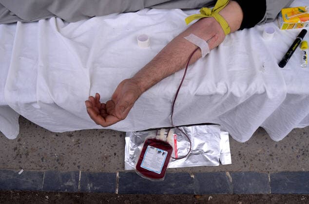 April 11, 2020: Peshawar, Pakistan. 11 April 2020. Volunteers donate blood for thalassemia patients in Peshawar. Restrictions imposed to curtail the spread of Coronavirus disease (COVID-19) in Pakistan have resulted in a shortage of blood donations, endangering the life of thalassemia-stricken patients in the country - ZUMAd99_ 20200411_zap_d99_001 Copyright: xHasnainxAlix
