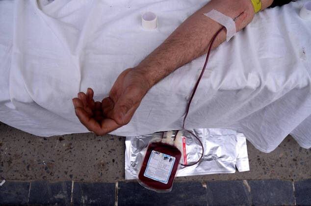 April 11, 2020: Peshawar, Pakistan. 11 April 2020. Volunteers donate blood for thalassemia patients in Peshawar. Restrictions imposed to curtail the spread of Coronavirus disease (COVID-19) in Pakistan have resulted in a shortage of blood donations, endangering the life of thalassemia-stricken patients in the country - ZUMAd99_ 20200411_zap_d99_005 Copyright: xHasnainxAlix