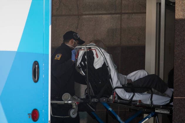 (200411) -- NEW YORK, April 11, 2020 -- A healthcare worker wheels a patient into the emergency room of BronxCare Hospital Center in the Bronx borough of New York, the United States, April 11, 2020. The number of COVID-19 cases in the United States topped 500,000 on Friday night, according to the Center for Systems Science and Engineering (CSSE) at Johns Hopkins University. (Photo by Michael Nagle Xinhua) U.S.-NEW YORK-COVID-19-CASES WangxYing 