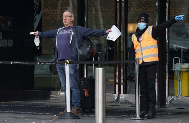 AUSTRALIA CORONAVIRUS COVID-19, A man reacts as he leaves the Crown Promenade Hotel after spending two weeks in forced quarantine in Melbourne, Sunday, April 12, 2020. Health authorities will stagger the release throughout the day of the international arrivals who have completed their mandatory isolation period. A shutdown of non-essential services is in effect Australia wide in a bid to slow the spread of the coronavirus (COVID-19) disease. ( NO ARCHIVING, EDITORIAL USE ONLY, NO USE IN BOOKS WITHOUT CONSENT MELBOURNE VIC AUSTRALIA  Copyright: xSCOTTxBARBOURx 20200412001463140847