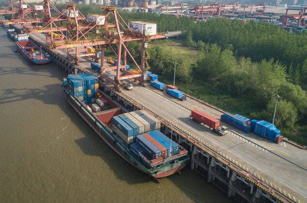 (200412) -- WUHAN, April 12, 2020 -- Photo taken on April 12, 2020 shows a view of the Yangluo Port in Wuhan, central China s Hubei Province. Wuhan, the megacity in central China, lifted outbound travel restrictions from April 8 after almost 11 weeks of lockdown to stem the spread of COVID-19. The cargos piled up at ports due to the COVID-19 pandemic have also been shipping away since the water ports in Wuhan resumed operation. ) CHINA-HUBEI-WUHAN-SHIPPING (CN) XiaoxYijiu 