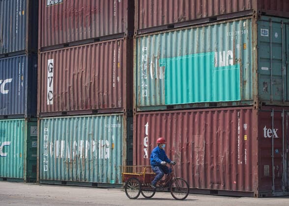 (200412) -- WUHAN, April 12, 2020 -- A staff member is seen at the Yangluo Port in Wuhan, central China s Hubei Province, April 12, 2020. Wuhan, the megacity in central China, lifted outbound travel restrictions from April 8 after almost 11 weeks of lockdown to stem the spread of COVID-19. The cargos piled up at ports due to the COVID-19 pandemic have also been shipping away since the water ports in Wuhan resumed operation. ) CHINA-HUBEI-WUHAN-SHIPPING (CN) XiaoxYijiu 