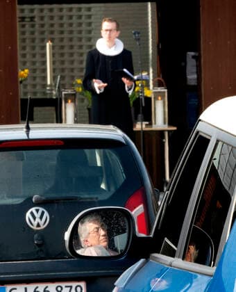 Pastor Isak Nolsoee holds church service in front of Roennevang Church on Sunday, April 12, 2020 Due to COVID 19, the Easter service becomes live-stream and can be experienced from the car in the square in front of the church photo Keld Navntoft Scanpix 2020, Taastrup,  Copyright: KeldxNavntoft KeldxNavntoftx COP101 spdk20200412-113516-L