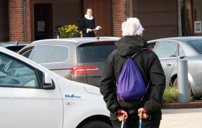 Pastor Isak Nolsoee holds church service in front of Roennevang Church on Sunday, April 12, 2020 Due to COVID 19, the Easter service becomes live-stream and can be experienced from the car in the square in front of the church photo Keld Navntoft Scanpix 2020, Taastrup,  Copyright: KeldxNavntoft KeldxNavntoftx COP101 spdk20200412-113539-L
