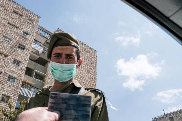April 12, 2020, Jerusalem, Israel: The Israel Police, reinforced by IDF soldiers, enforces a newly imposed full closure on Givat Mordechai neighborhood, one of 17 predominantly Jewish religious neighborhoods in Jerusalem, with increased coronavirus infections. The number of confirmed COVID-19 cases in Israel rises to 10,878, with 103 deaths. Jerusalem Israel - ZUMAa126 20200412_zap_a126_001 Copyright: xNirxAlonx