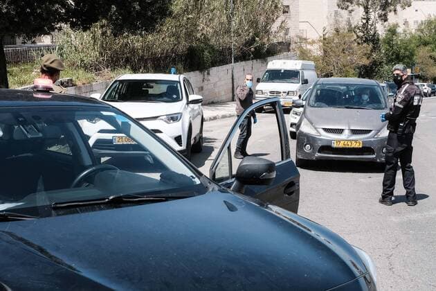 April 12, 2020, Jerusalem, Israel: The Israel Police, reinforced by IDF soldiers, enforces a newly imposed full closure on Har Nof neighborhood, one of 17 predominantly Jewish religious neighborhoods in Jerusalem, with increased coronavirus infections. The number of confirmed COVID-19 cases in Israel rises to 10,878, with 103 deaths. Jerusalem Israel - ZUMAa126 20200412_zap_a126_003 Copyright: xNirxAlonx