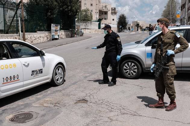 April 12, 2020, Jerusalem, Israel: The Israel Police, reinforced by IDF soldiers, enforces a newly imposed full closure on Har Nof neighborhood, one of 17 predominantly Jewish religious neighborhoods in Jerusalem, with increased coronavirus infections. The number of confirmed COVID-19 cases in Israel rises to 10,878, with 103 deaths. Jerusalem Israel - ZUMAa126 20200412_zap_a126_008 Copyright: xNirxAlonx