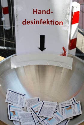 12 04 2020, Catholic Easter Mass at the drive-in cinema in Düsseldorf, bowl with hand disinfecting tissues in the toilet area 12 04 2020, Catholic Easter Mass at the drive-in cinema in Düsseldorf 12 04 2020, Catholic Easter Mass at the drive-in cinema in Düsseldorf