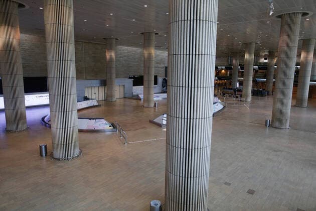 (200412) -- TEL AVIV, April 12, 2020 (Xinhua) -- Photo taken on April 12, 2020 shows the arrival hall at Ben-Gurion International Airport near Israeli city of Tel Aviv amid the coronavirus pandemic. Israeli Prime Minister Benjamin Netanyahu ordered on Saturday to stop all flights to the country after passengers entered Israel without health supervision amid the novel coronavirus pandemic. According to the Israeli government s instructions, anyone who lands in the country must immediately enter a 14-day quarantine. (Photo by Gil Cohen Magen Xinhua) MIDEAST-TEL AVIV-COVID-19-FLIGHT STOP 