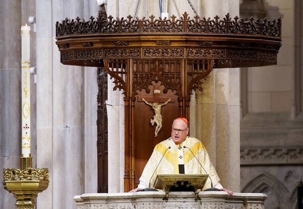 Church pews are empty of parishioners due to the Coronavirus pandemic while Cardinal Timothy Dolan offers Easter Sunday Mass at St. Patrick s Cathedral in New York City on Sunday, April 12, 2020. For the first time, the United States government and President Trump have declared all 50 states a major disaster for the same event.  NYP20200412117 JOHNxANGELILLO