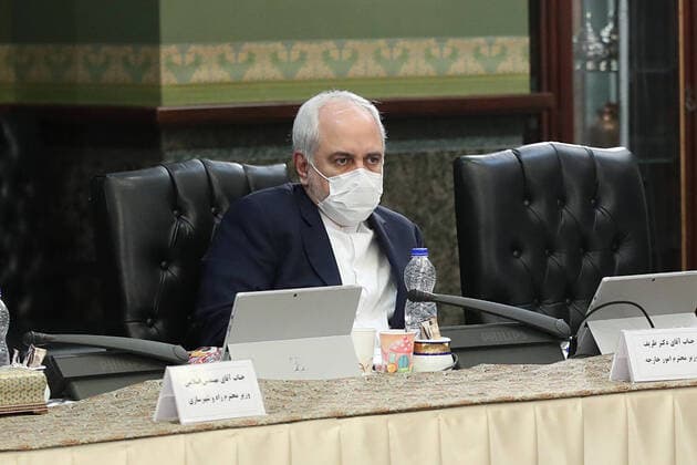 April 12, 2020, Tehran, Iran: A handout picture provided by the on April 12, 2020, shows Iranian Foreign Minister, MOHAMMAD JAVAD ZARIF, wearing a protective mask amid the COVID-19 pandemic during a cabinet session in the capital Tehran. Iran announced 117 new deaths from the novel coronavirus, bringing the overall official toll to 4,474, even as it eased some restrictions that had been imposed to slow the spread of the illness. Tehran Iran - ZUMAi98_ 20200412_zih_i98_006 Copyright: xIranianxPresidencyx