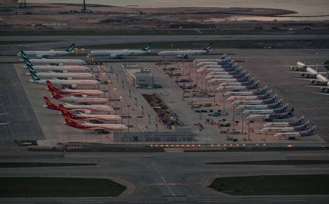 April 12, 2020, Hong Kong, China: Many aircraft parked at the Hong Kong International Airport. Airlines across the globe have cancelled flights, postponed or adjusted their services in response to the coronavirus outbreak. Hong Kong China  - ZUMA 20200412_mda_j323_032 Copyright: xMayxJamesx