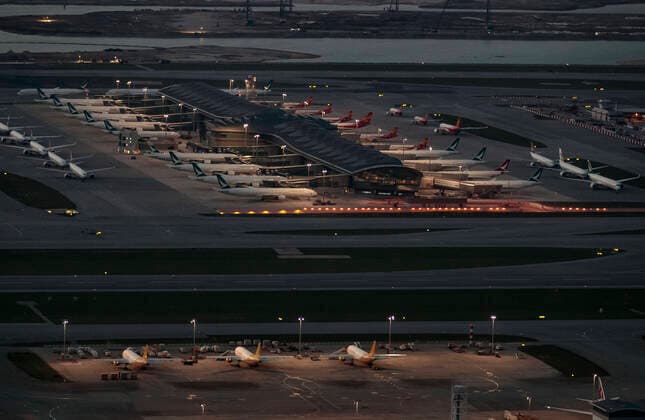 April 12, 2020, Hong Kong, China: Many aircraft parked at the Hong Kong International Airport. Airlines across the globe have cancelled flights, postponed or adjusted their services in response to the coronavirus outbreak. Hong Kong China - ZUMA 20200412_mda_j323_030 Copyright: xMayxJamesx