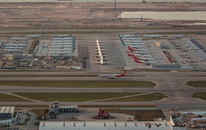 April 12, 2020, Hong Kong, China: Many aircraft parked at the Hong Kong International Airport. Airlines across the globe have cancelled flights, postponed or adjusted their services in response to the coronavirus outbreak. Hong Kong China  - ZUMA 20200412_mda_j323_037 Copyright: xMayxJamesx