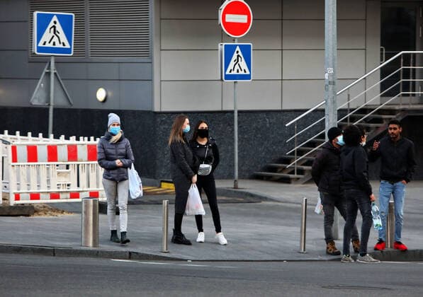 KYIV, UKRAINE - APRIL 12, 2020 - People are seen on a street wearing face masks during a quarantine period caused by the COVID-19 pandemic, Kyiv, capital of Ukraine. Daily life of Kyiv in quarantine  Copyright: xOvsyannikovaxYuliax