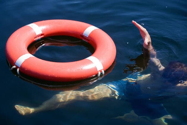 Person Drowning A person in a large body of water drowning  Copyright: xleafx 560569