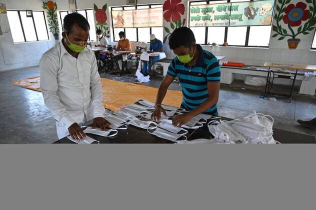 April 13, 2020, Kaushambi, Uttar Pradesh, India: Kaushambi: Prisoners making mask at Kausmabi districtÃ¢â‚¬â ¢s prison during a nationwide lockdown during a government-imposed nationwide lockdown as a preventive measure against the COVID-19 coronavirus, in Kaushambi district of Uttar Pradesh, on Monday, April 13, 2020. Kaushambi India - ZUMAv115 20200413_zap_v115_006 Copyright: xPrabhatxKumarxVermax