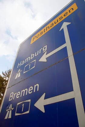 Signpost to the A1 motorway Hamburg Bremen at the Posthausen junction of the country road from Ottersberg to Posthausen The section of the A1 motorway between the Buchholz triangle and Bremen is operated in a public-private partnership by the A1 mobil company